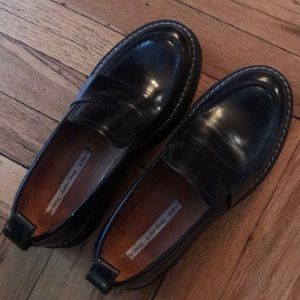 Black platform loafers